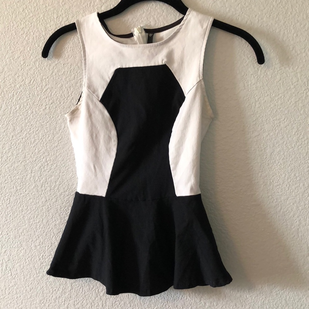 Black and white peplum top with zipper